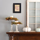 Frame hanging on wall in home